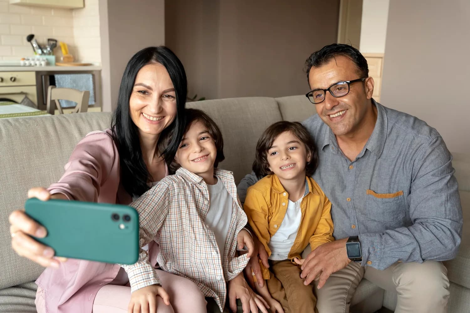 Family taking a photograph together